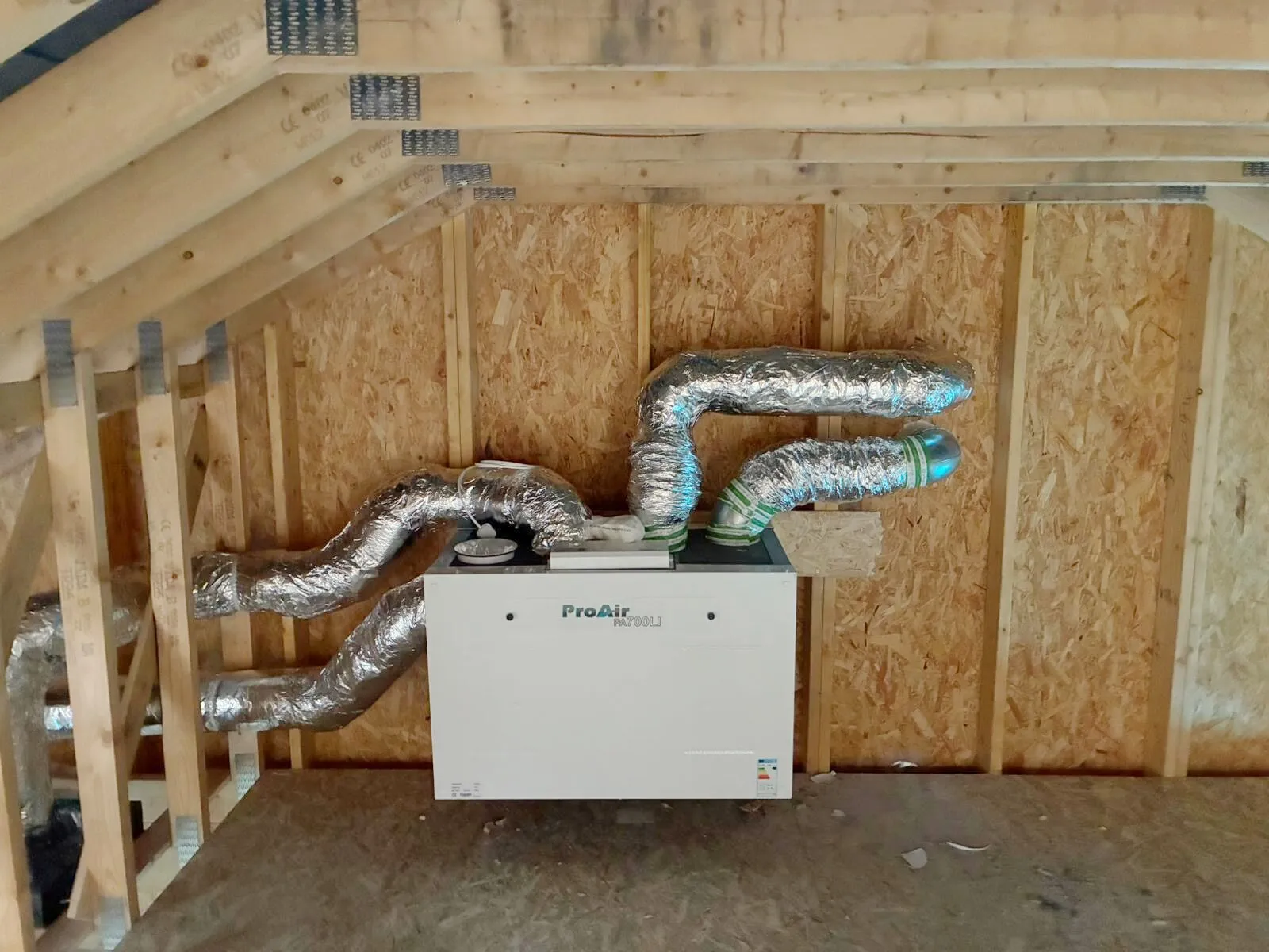 ProAir MVHR unit and ventilation ducts installed in an attic